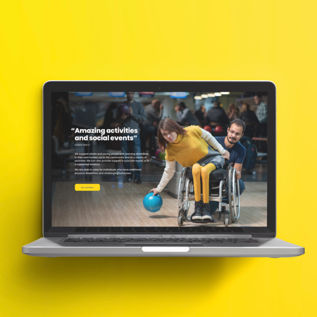 One Fylde website shown on a laptop showing a woman in a wheelchair bowling, with the testimonial 'Amazing activities and social events'.