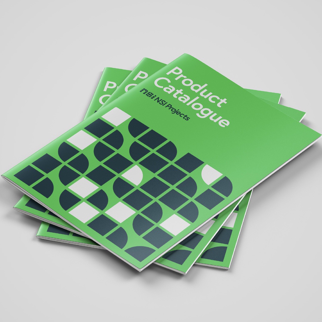 Mockup of stacked NSI Projects Product Catalogue booklets with a green cover and geometric pattern design.